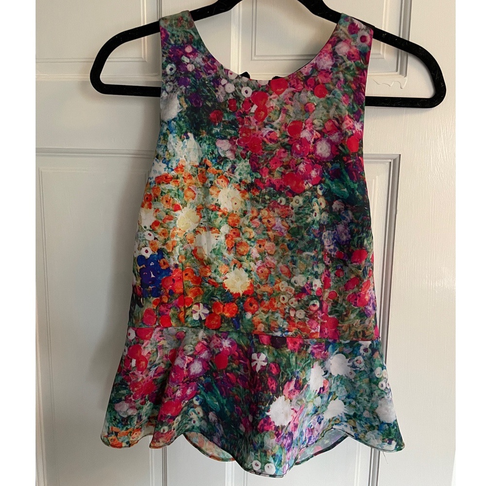 UNDER SKIES FLORAL PEPLUM TOP